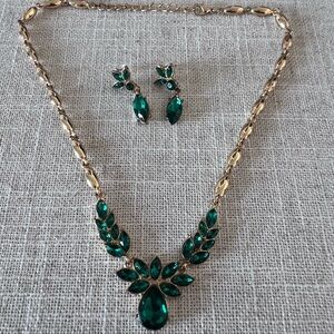 Gold necklace and earring costume jewelry set.